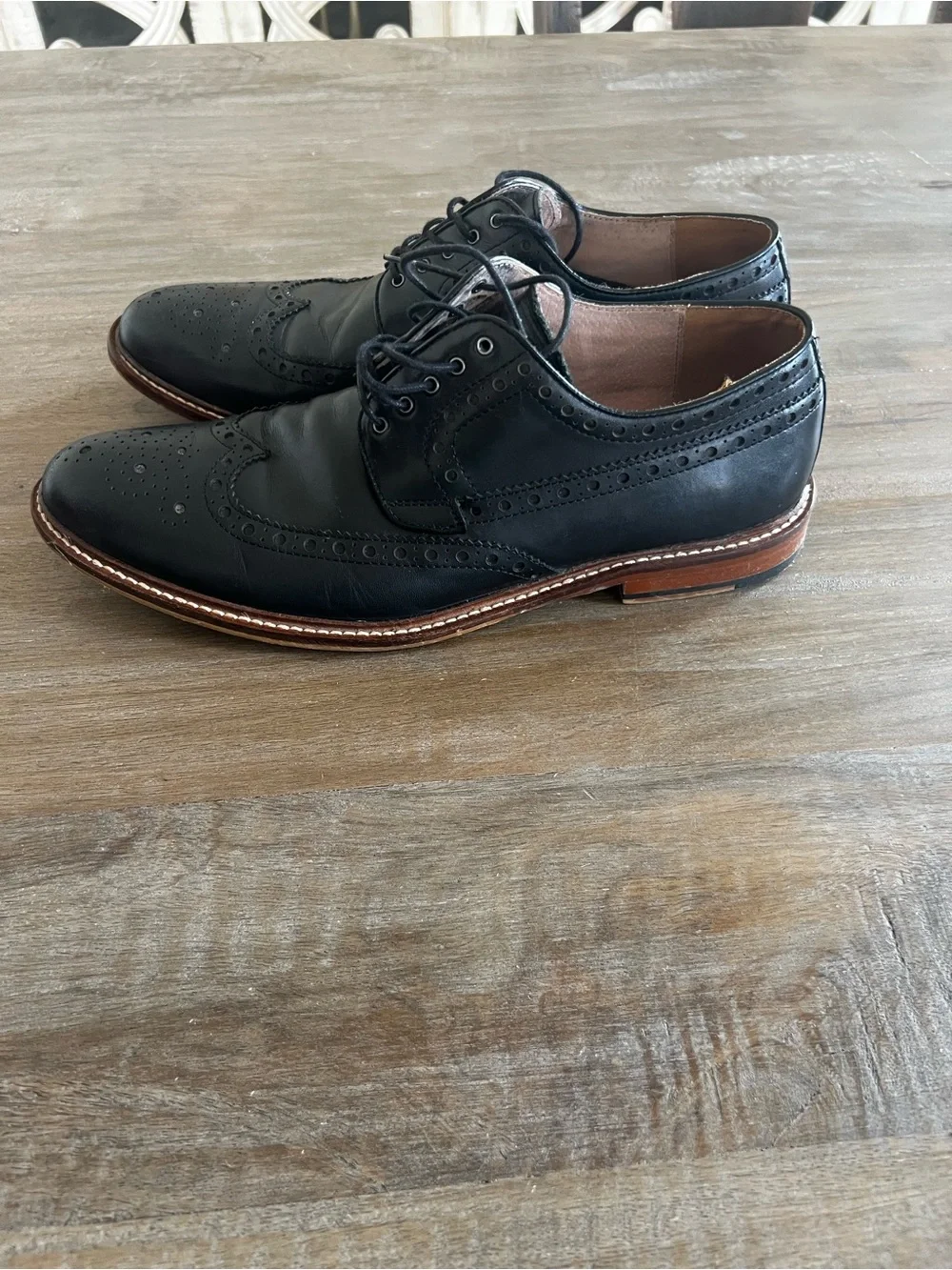 Classic Black Leather Wingtip Oxfords with Contrast Welt